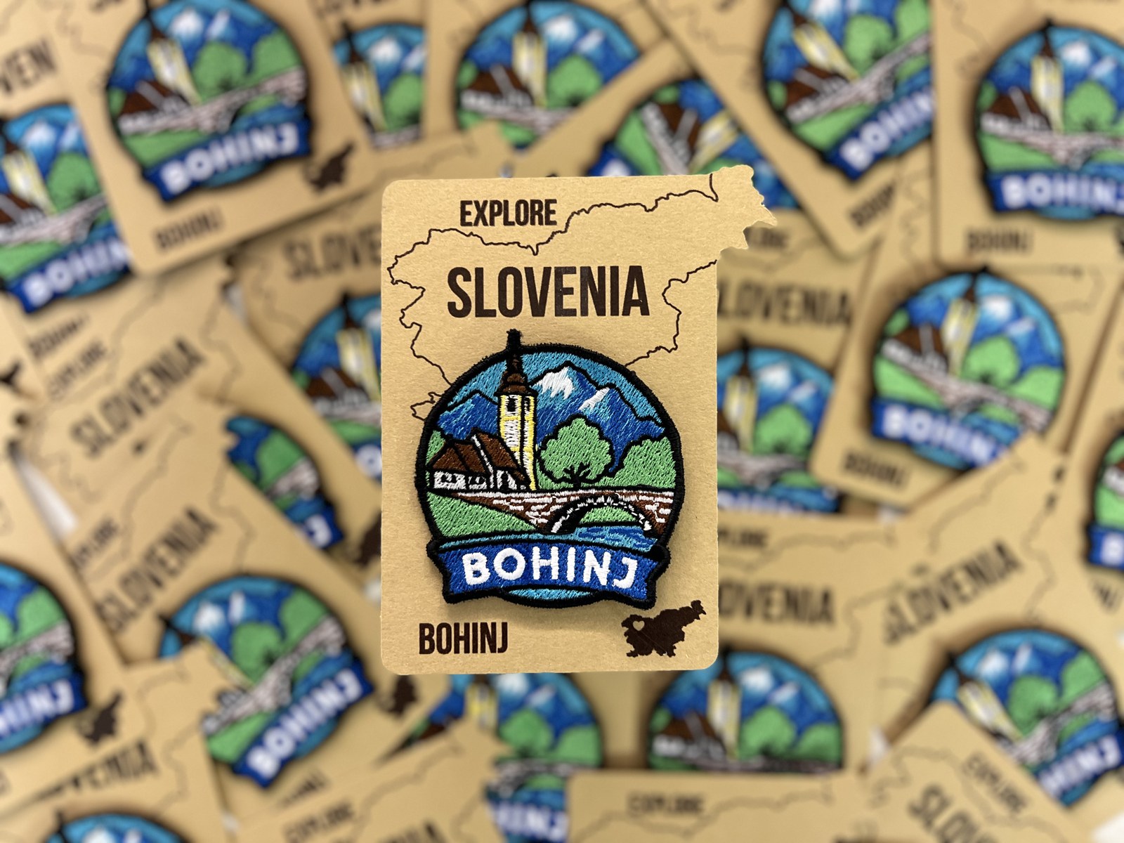 Vezeni našitki Bohinj – izveden projekt ML Design